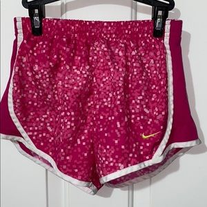 Pink Nike athletic shorts